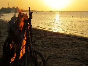 On the beach, sun loungers, beach towels