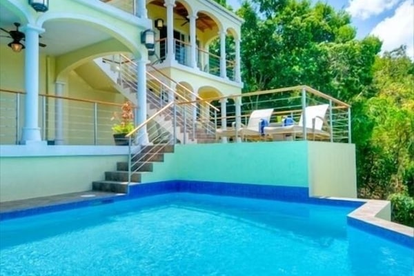 Swim & Siesta on the villa's expansive outdoor patios, verandas and decks