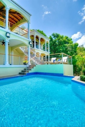 Swim & Siesta on the villa's expansive outdoor patios, verandas and decks