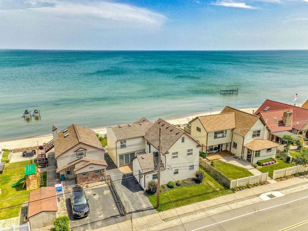 Waterfront Home on Lake Ontario with 50' of Sandy Beach!