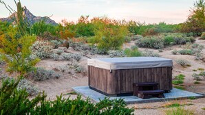 A hot tub in a desert setting with a wooden deck and a view of a mountain. - Family-Friendly Beautiful Private Wellness Retreat / Desert Oasis (Scottsdale)