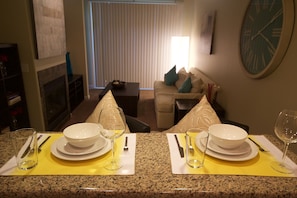 TV, fireplace, books