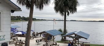 Lake Front House with Covered Boat Dock, Great Fishing, Pets, internet, canoe