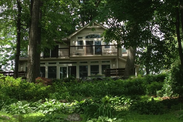 Lakefront home with a wall of windows facing Upper Greenwood Lake.