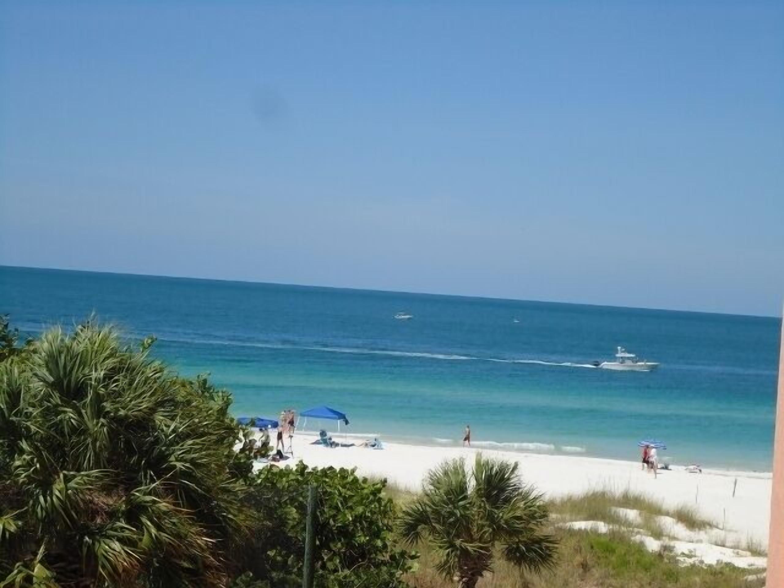 On the beach, sun-loungers, beach towels