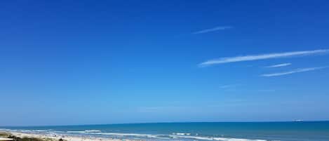 On the beach, sun-loungers, beach towels