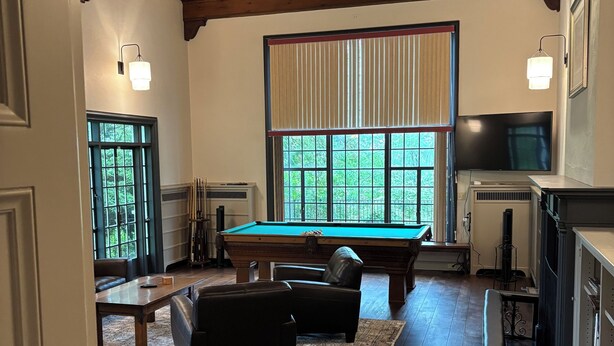 A spacious room with a pool table, leather sofas, and a billiards rack. - Destination, Overlooking Cooperstown, Large Grounds, 6.2 miles from Dreams Park. (COOPERSTOWN)