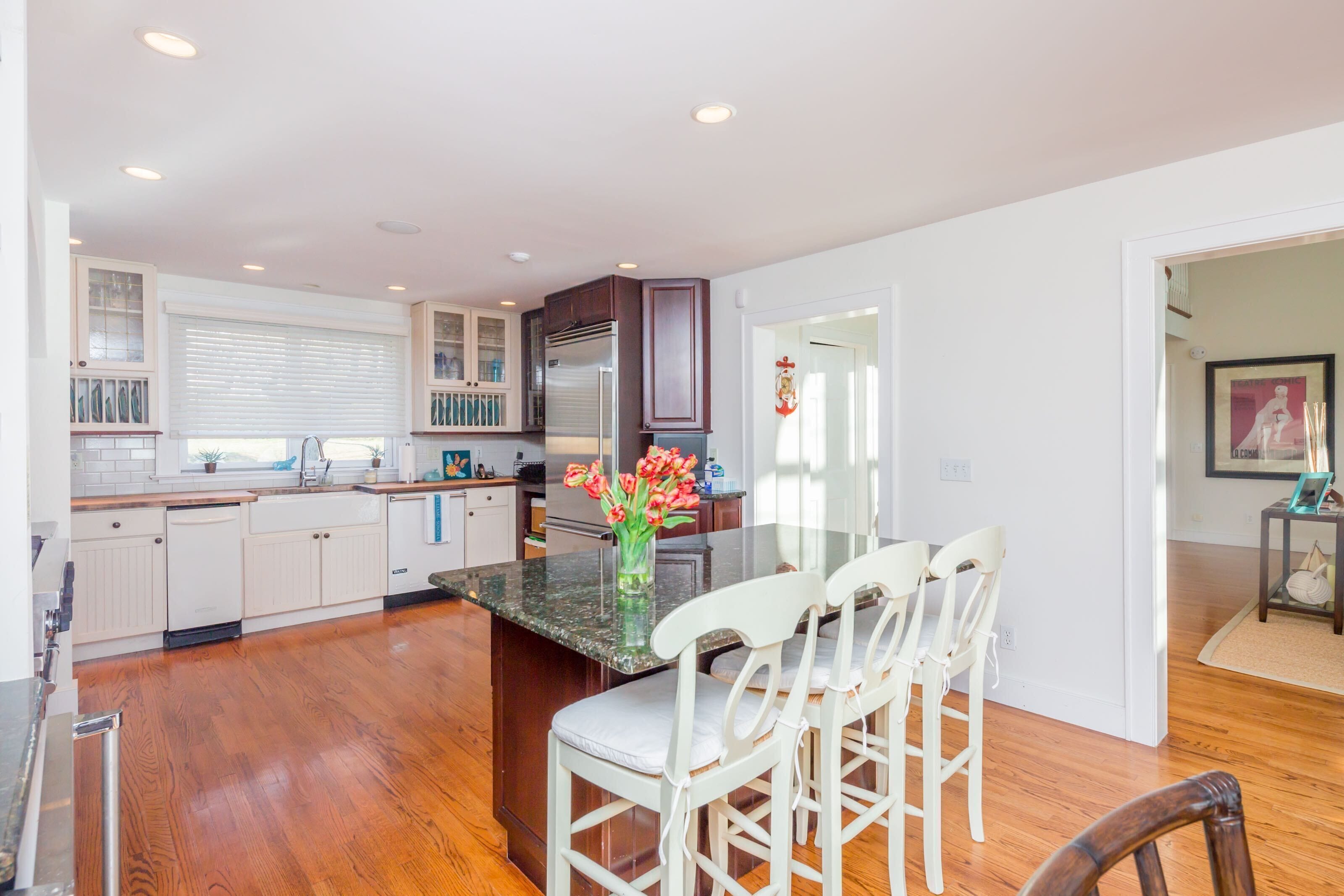 Waterfront on the Bay! A beautiful 5 bedroom home with dock and walk to Beach...