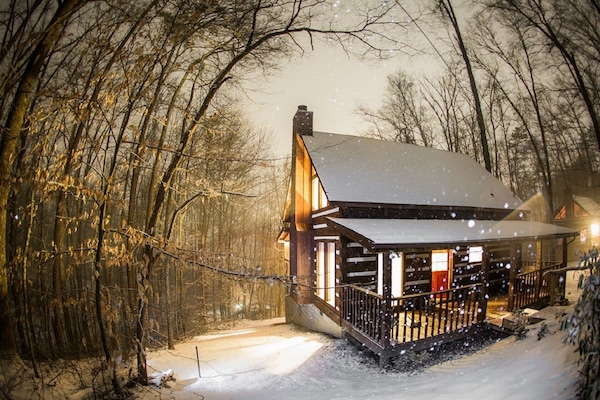A night picture of our cabin during a 2014 Winter Snow.
