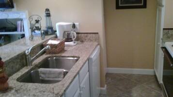 Fridge, microwave, dishwasher, coffee/tea maker