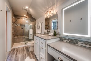 Combined shower/bathtub, hair dryer, towels, soap