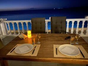 Outdoor dining - Exclusive Oceanfront Apartment Belair, Bonaire. You can't get closer to the sea! (Kralendijk, Belnem)