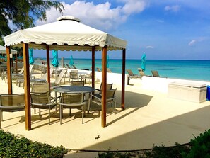 Outdoor dining - Spectacular Beachfront Condo, Seven Mile Beach - Ground Floor! (George Town)