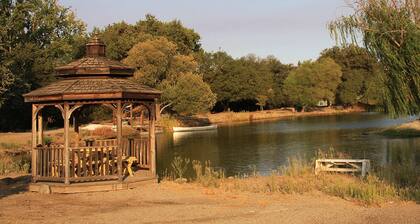 Home in park like setting with 3 acre lake .