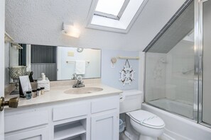 Bathtub, hair dryer, towels
