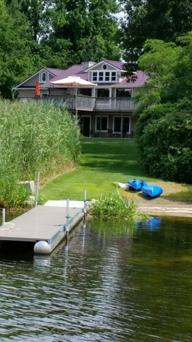 Secluded wooded lot on Private Lake includes Pontoon boat
