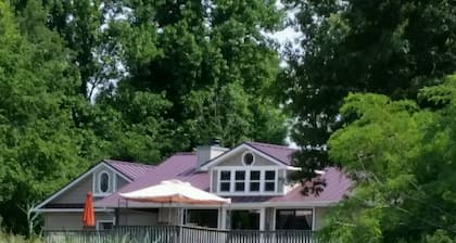 Secluded wooded lot on Private Lake includes Pontoon boat