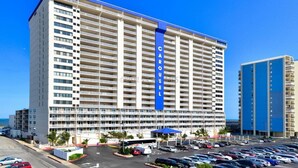 A multi-story hotel with a prominent blue sign reading "CAROUSEL." - Carousel Oceanfront Condo w/ Stunning Ocean & Bay Views! (Ocean City)