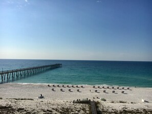 On the beach, sun loungers, beach towels