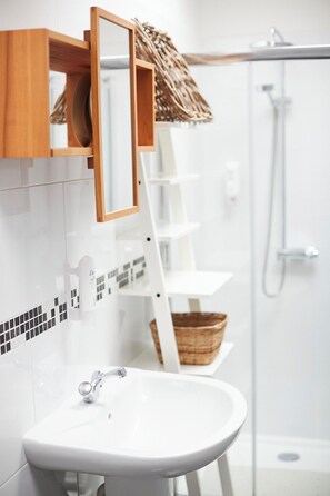 Bathtub, hair dryer, towels, soap