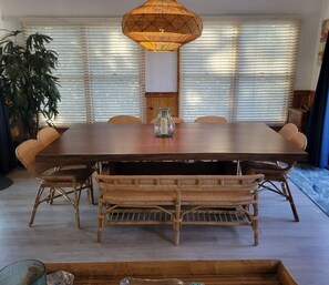 Enjoy meals in this dining area with a large table and six comfortable chairs.