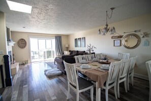Flat-screen TV, fireplace, video games, DVD player