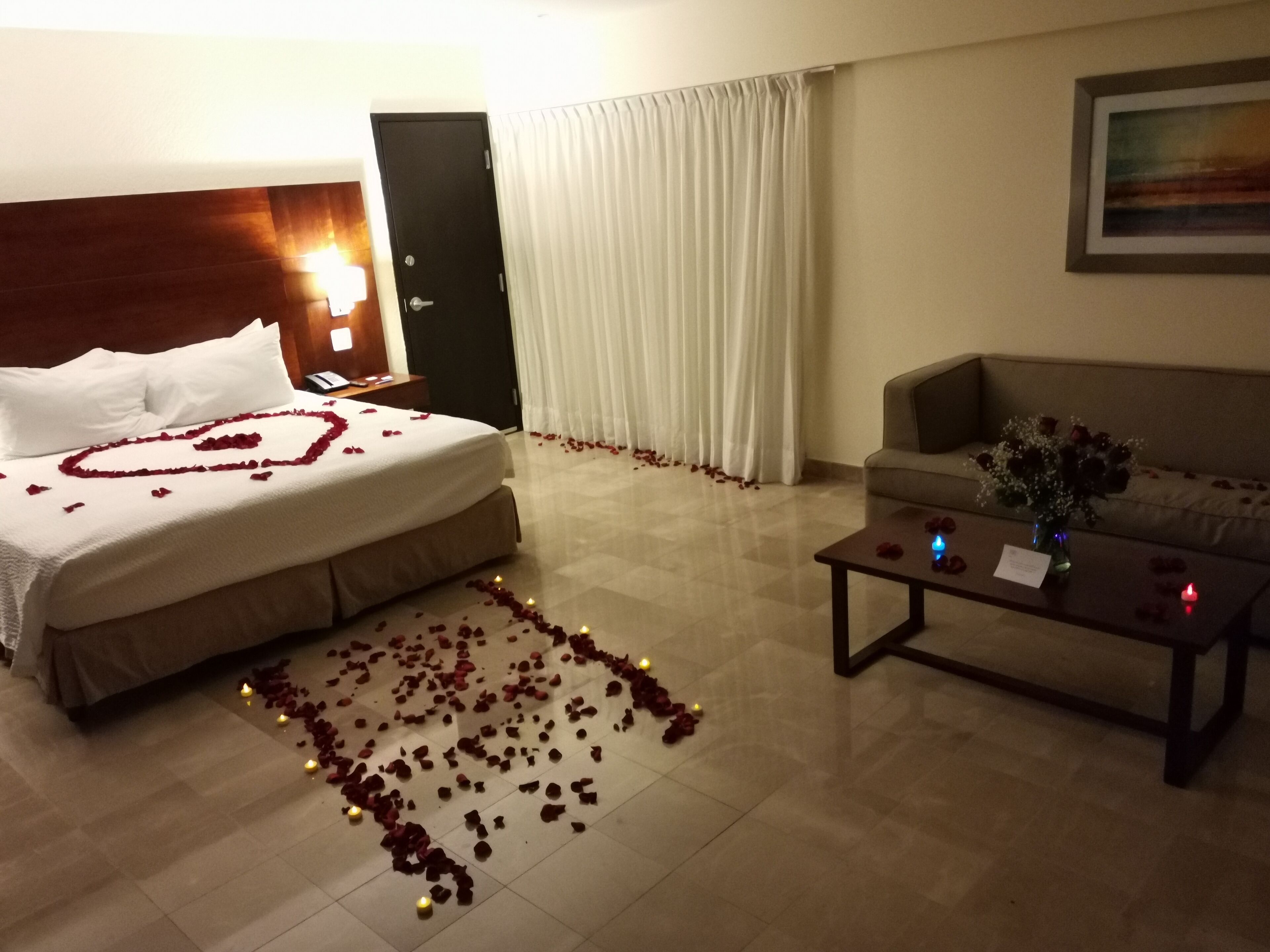 suite, 1 king bed with sofa bed, balcony, partial ocean view (balcony) | in-room safe, individually decorated, individually furnished, desk