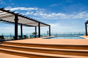 Outdoor pool, open 8:00 AM to 9:00 PM, sun loungers