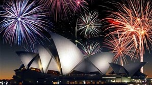 The Sydney Opera House with fireworks in the background.
