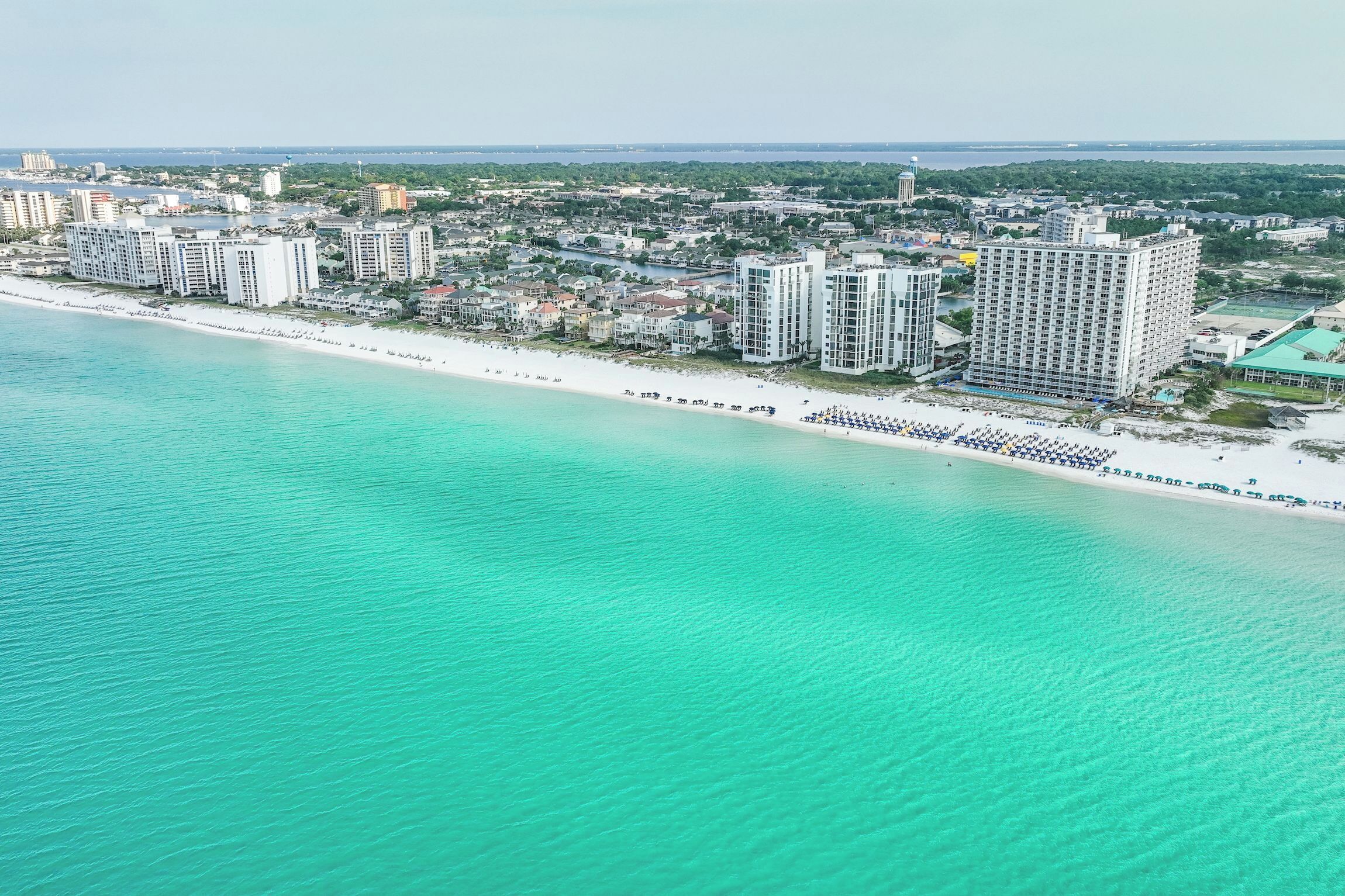 On the beach, sun loungers, beach umbrellas, beach towels