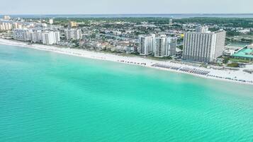 On the beach, sun loungers, beach umbrellas, beach towels