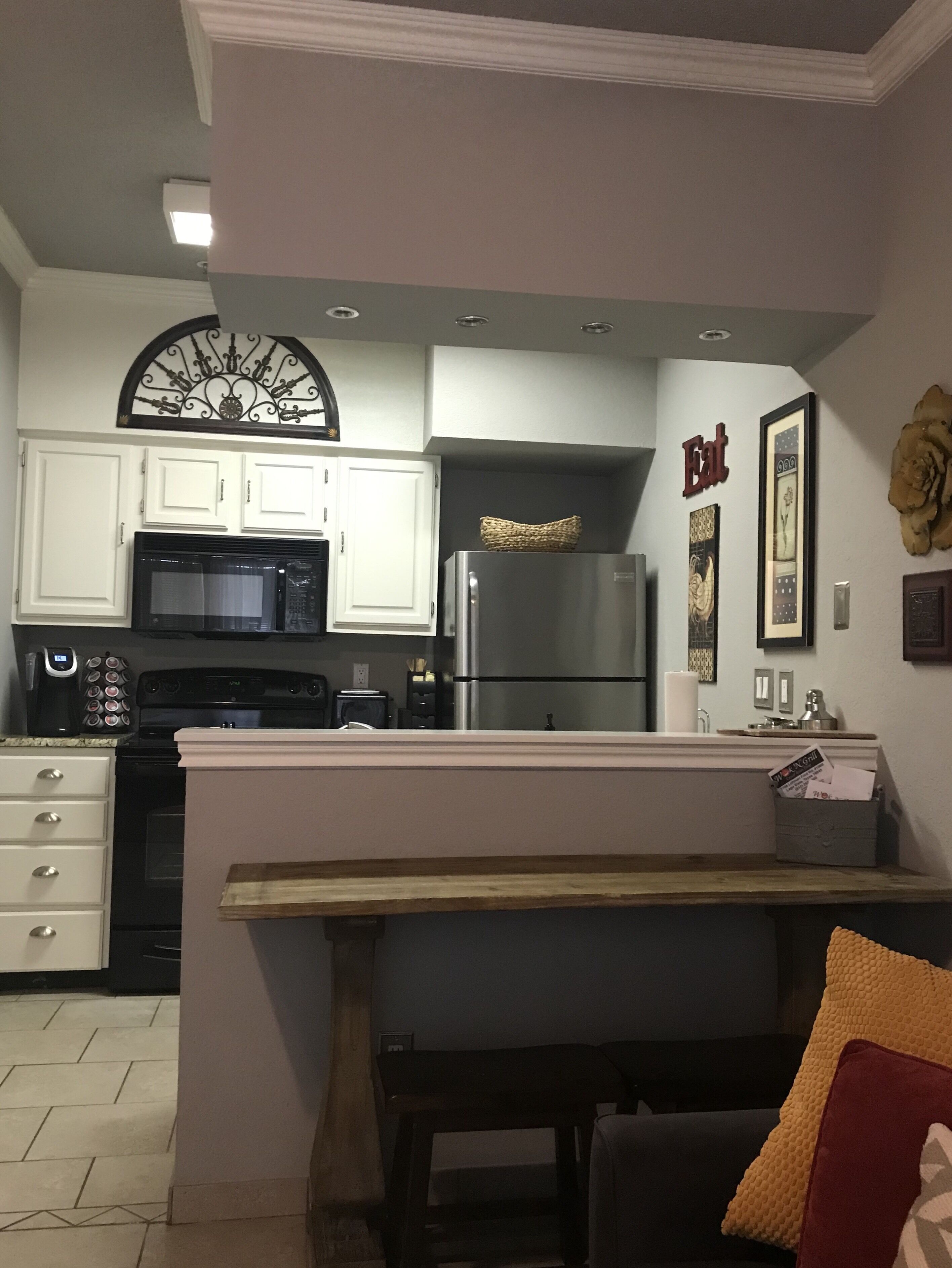 This cozy 1 bedroom condo is located on the The Island on Lake Travis.