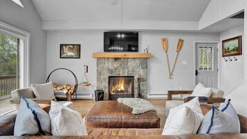 Smart TV, fireplace, table tennis, books
