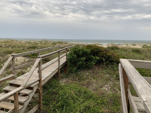 Ocean-side condominium with pool. Fully-equipped for relaxed vacationing.