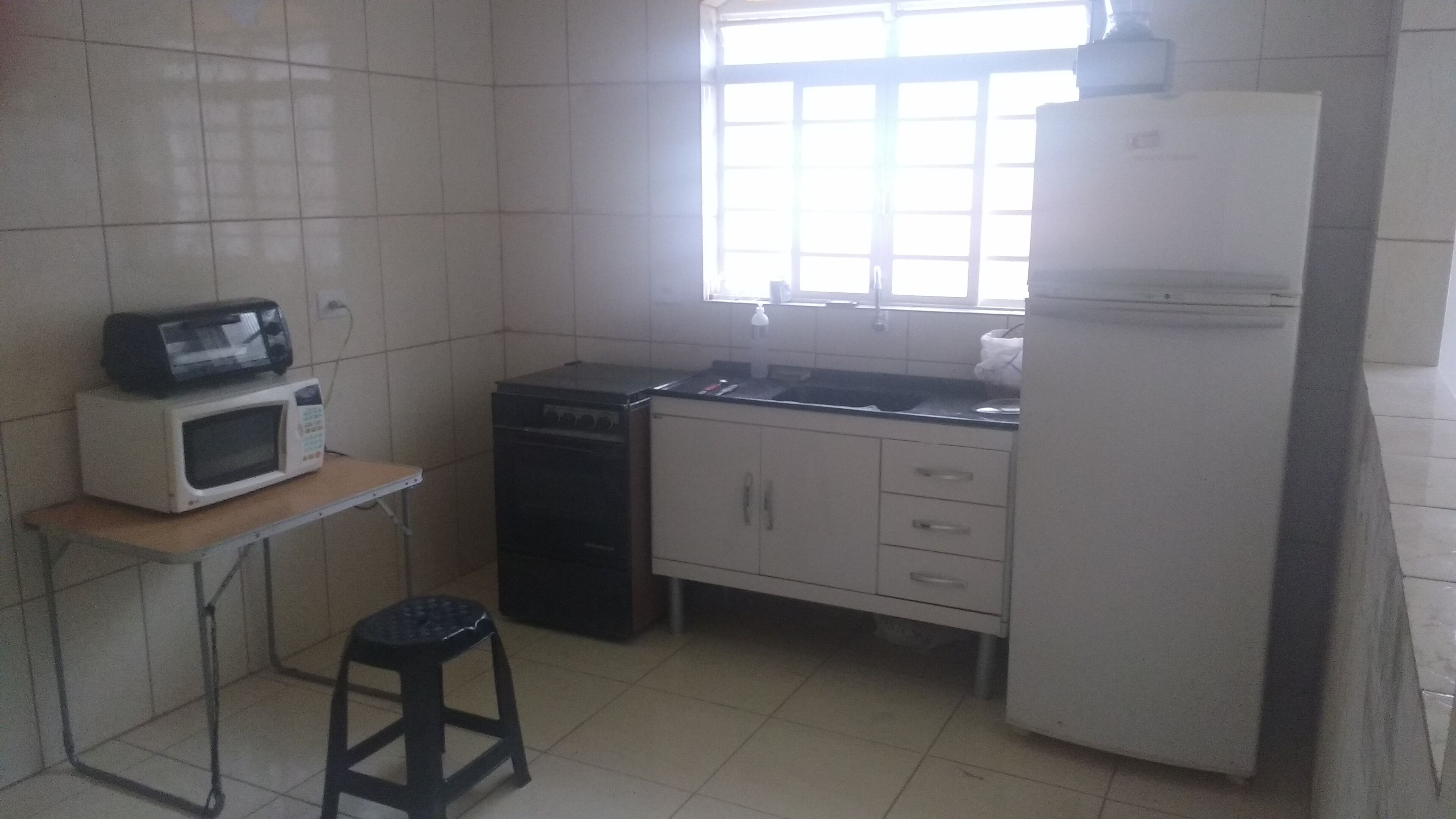 Kitchen, living room, bedroom, bathroom with laundry