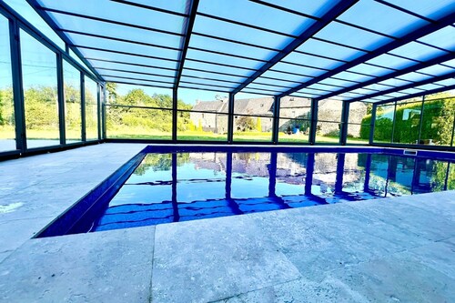 Traditional Breton home now a comfortable family gîte with heated swimming pool