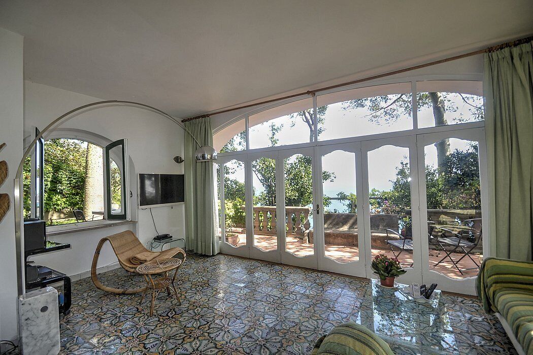 Villa Rachele: A charming two-story villa built on the sloping cliff in front of the sea, with Free WI-FI.