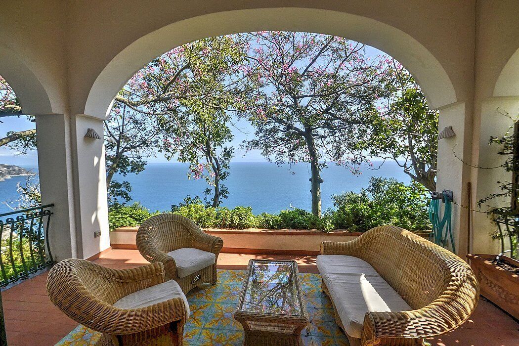 Villa Rachele: A charming two-story villa built on the sloping cliff in front of the sea, with Free WI-FI.