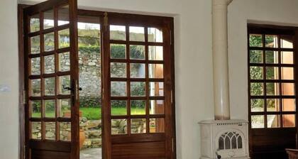 Charming house with garden and close to Ballota beach.