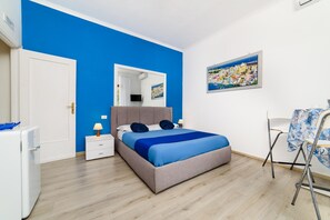 1 habitación, tabla de planchar con plancha, wifi gratis y ropa de cama 