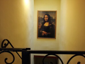 A painting of the Mona Lisa on a wall. - Residence MONNA LISA accommodates up to 7 people (Firenze)