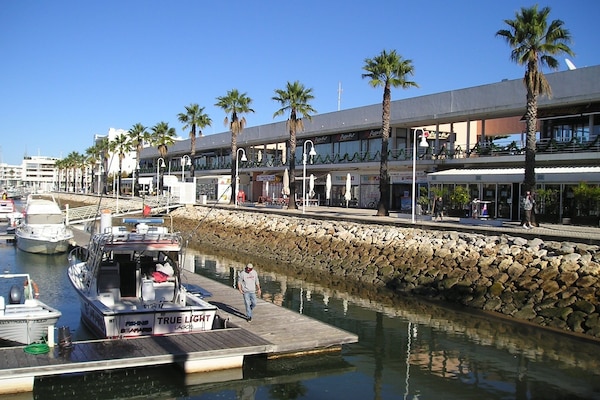 Lagos Marina with its waterfront cafes and restaurants is a 5-minute walk away