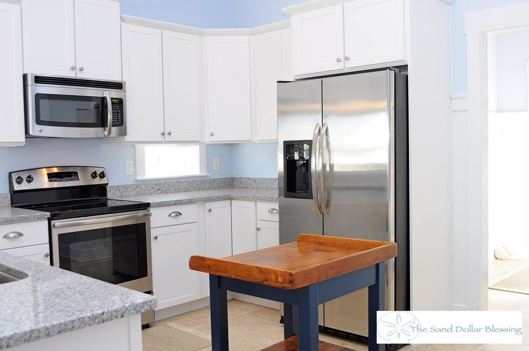 Escape to great views of the ocean & sound in this sun soaked reverse plan home