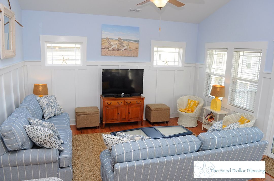 Escape to great views of the ocean & sound in this sun soaked reverse plan home