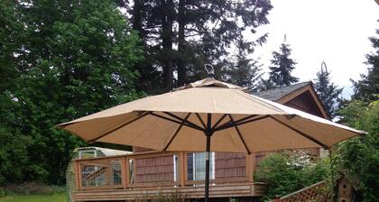 Casa familiar con playa privada e impresionantes vistas a la montaña