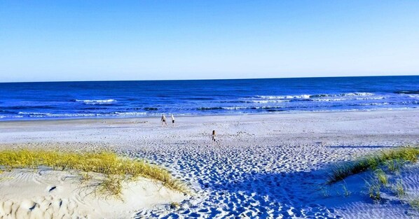 On the beach, sun loungers