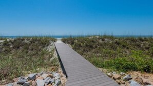 A wooden boardwalk leading to a beach with clear skies. - 47 Dune Lane - My Sunshine, Oceanfront 5 Bedroom, North Forest Beach (Hilton Head Island)