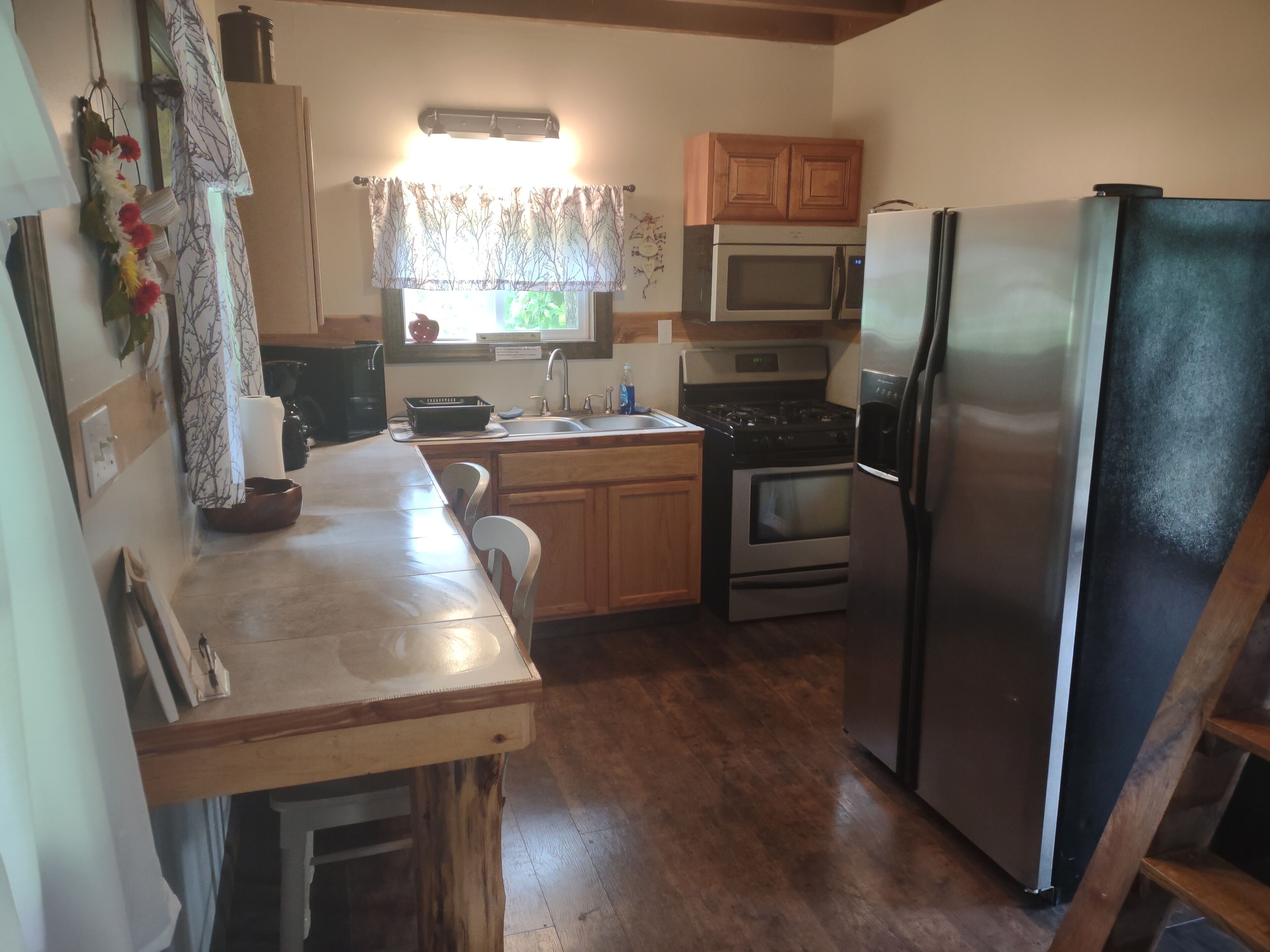 Quaint, secluded cabin with the feel of home. Sleeps 4 with home-like amenities.