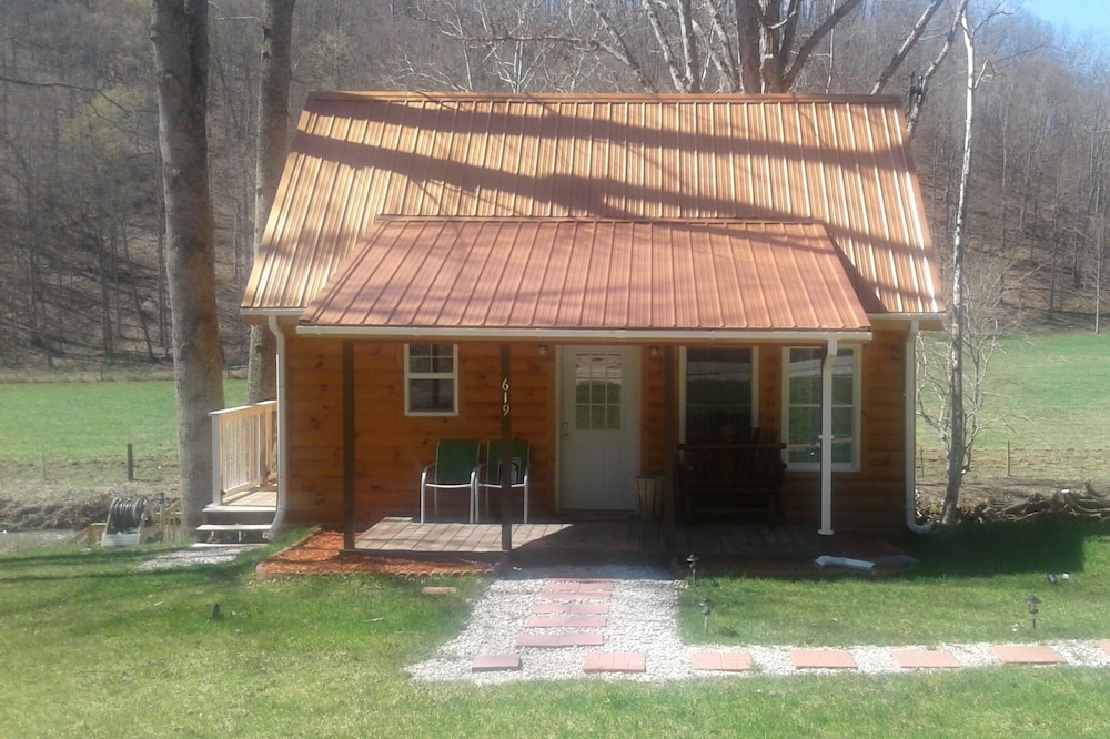 Quaint, secluded cabin with the feel of home. Sleeps 4 with home-like amenities.