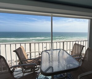 Outdoor dining - Fully Renovated Gulf-Front Condo 2 King Beds Indoor/Outdoor Pools Walk to Dining (Orange Beach)